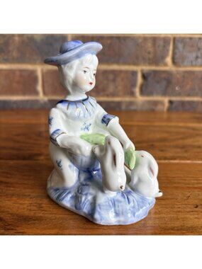 Blue And white Figurine Gold Accents Lady Girl Feeding Bunnies Rabbits